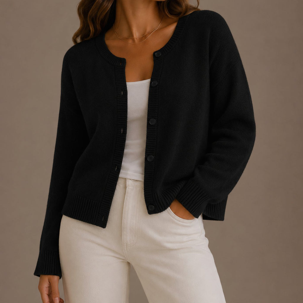 Detalle del tejido de punto suave de la chaqueta cárdigan mujer