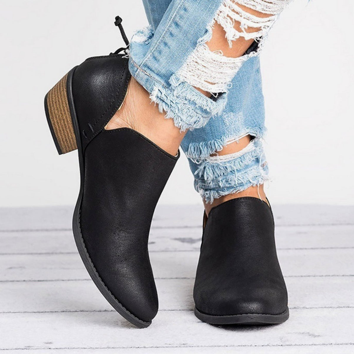 Botines RENNA con pantalón de vestir para un estilo de oficina